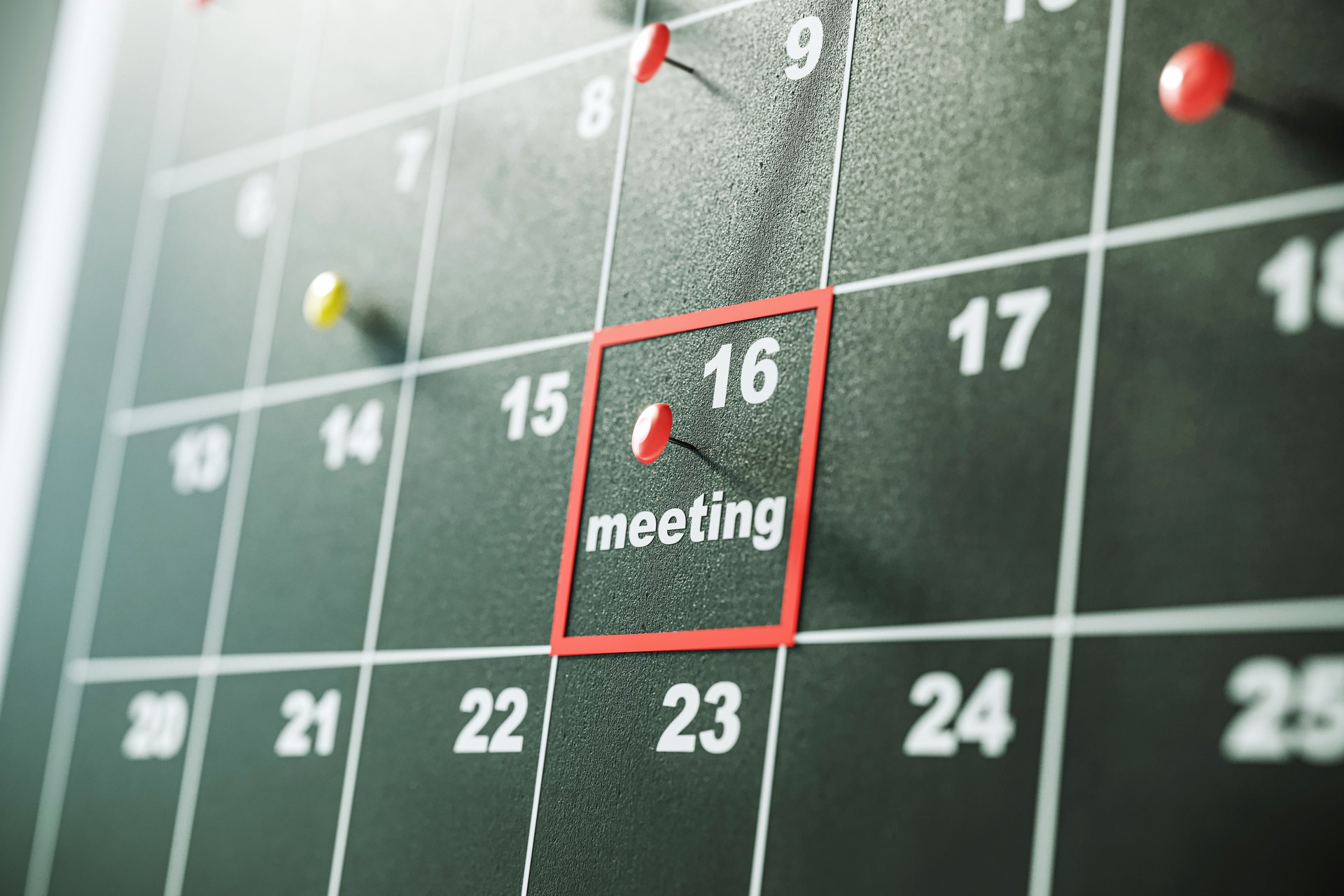 Closeup of a calendar with a pinned meeting on the 16th day. 3D Rendering